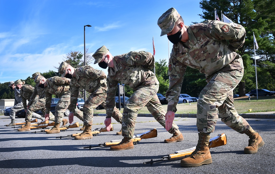 Members of the 66th Force Support Squadron Patriot Honor Guard practice modified commands during a ceremonial drill training session at Hanscom Air Force Base, Mass., Aug. 13, 2020, to ensure they can continue supporting veterans’ funerals across New England and New York. The 66 FSS was recently named the best force support unit in the Air Force Materiel Command, small base category and awarded the 2020 Maj. Gen. Eugene L. Eubank Award. (U.S. Air Force photo by Linda LaBonte Britt)