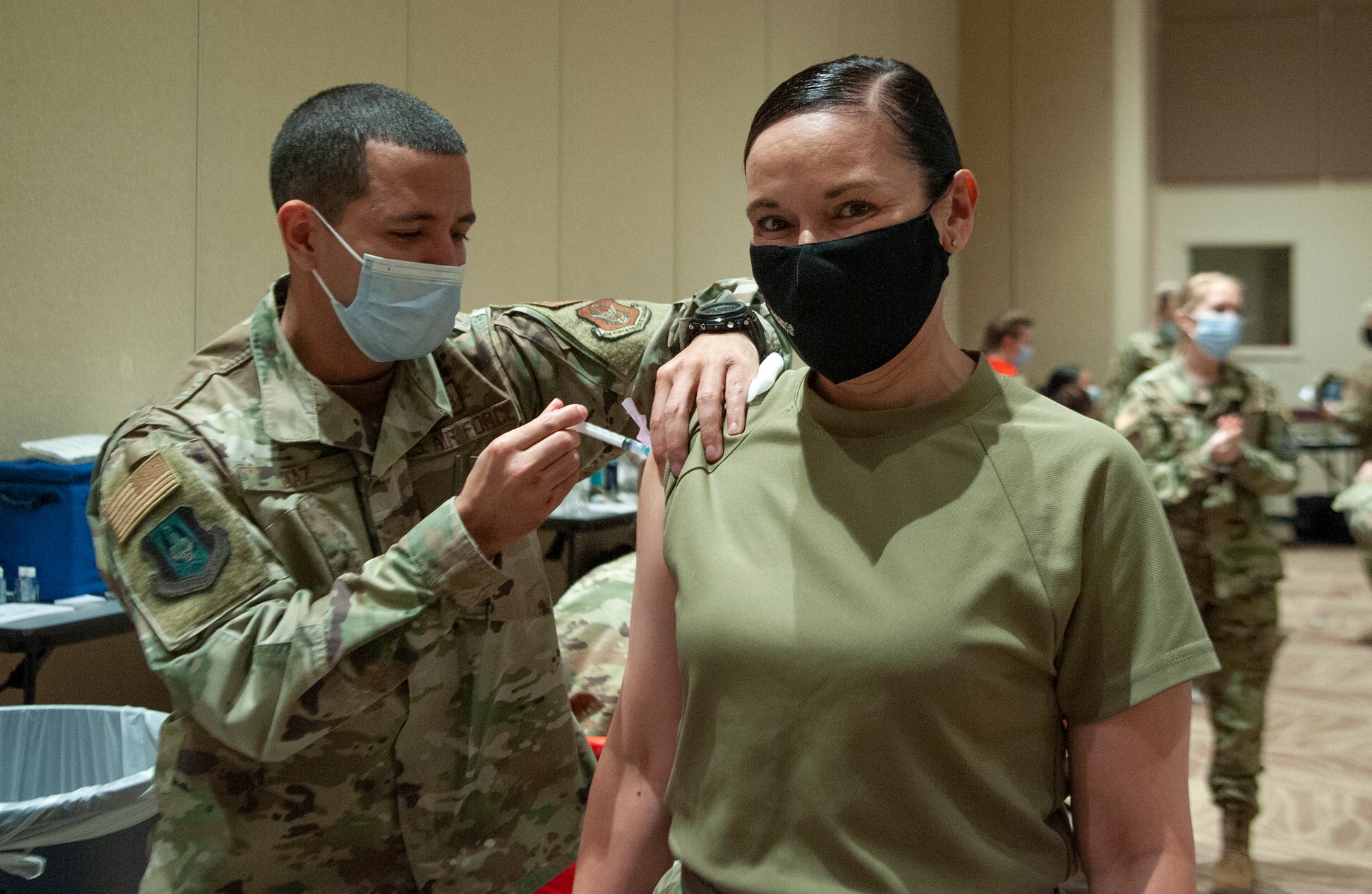 Chief Master Sergeant Billie M. Baber, Headquarters Air Reserve Personnel Center command chief, receives her first dose of the COVID-19 vaccination