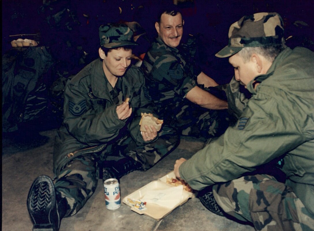 Air Force Reserve members say their farewells at the send off event prior to deploying in support of Operation Desert Storm in 1991.(U.S. Air Force photo provided)