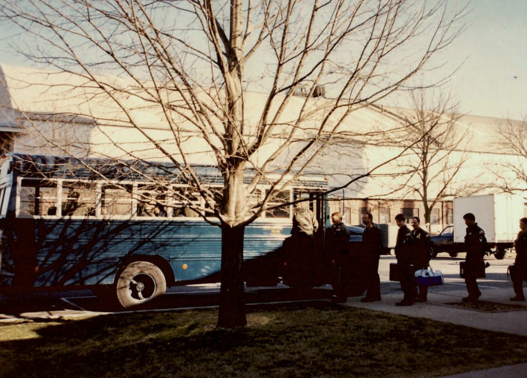 Air Force Reserve members board the bus to leave after the send off event to deploy in support of Operation Desert Storm in 1991.(U.S. Air Force photo provided)