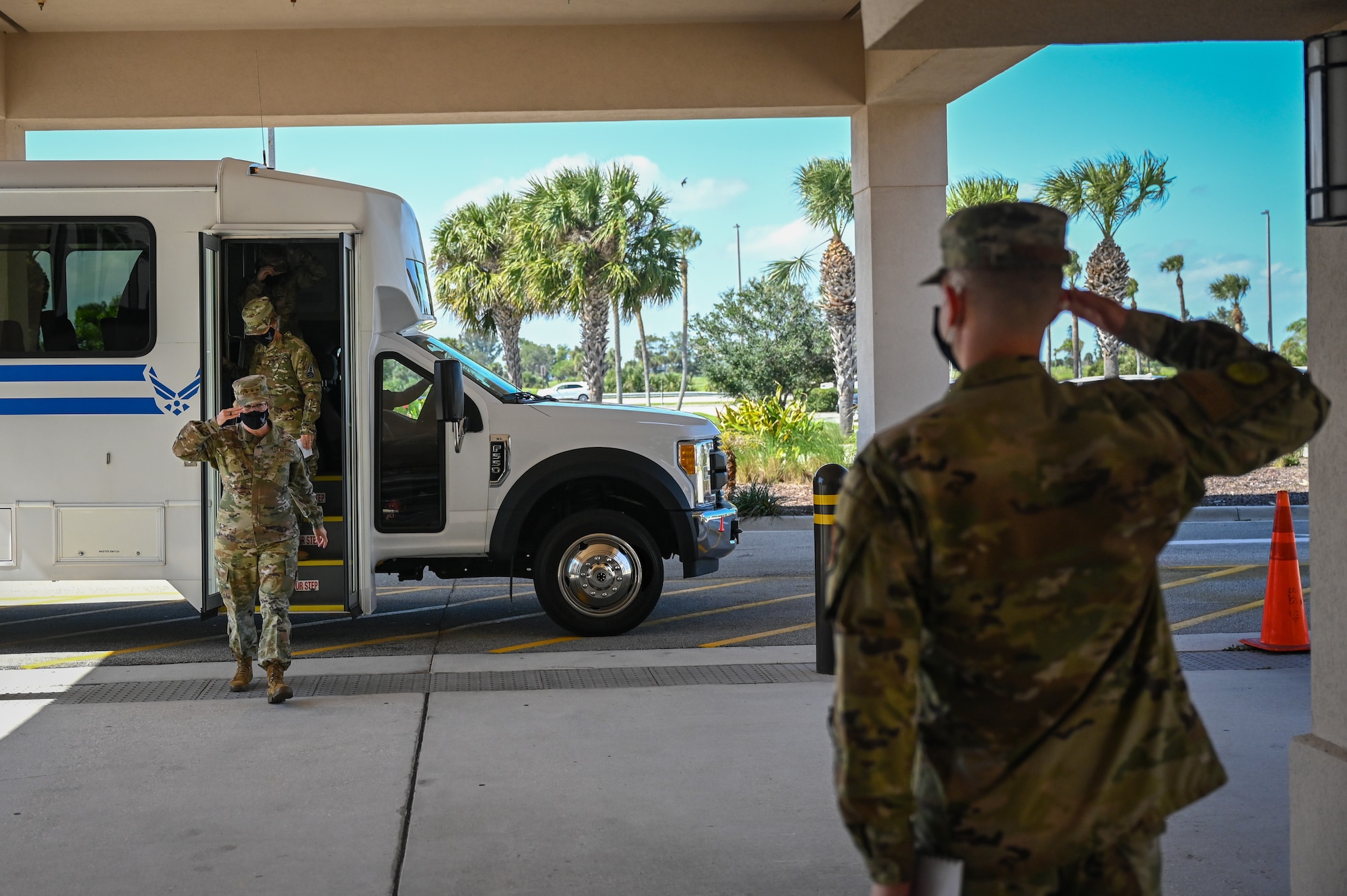 Lt. Gen. Dorothy Hogg, U.S. Air Force Surgeon General, salutes 45th Medical Group Airman at Patrick Space Force Base, Fla., Feb. 23, 2021. During her visit, Hogg visited staff from multiple sections within the 45th Medical Group. (U.S. Space Force photo by Airman First Class Thomas Sjoberg)