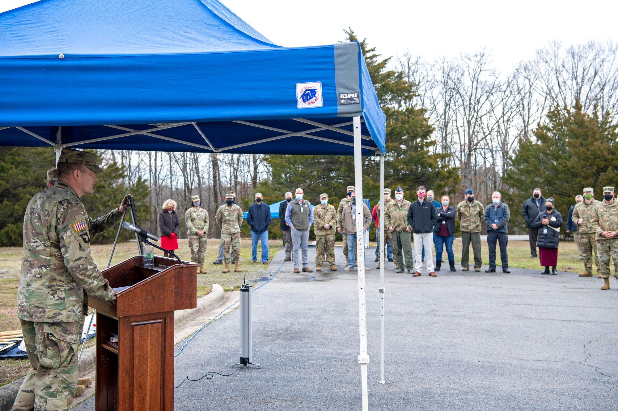 Col. Noe speaks with guests during a groundbreaking ceremony.