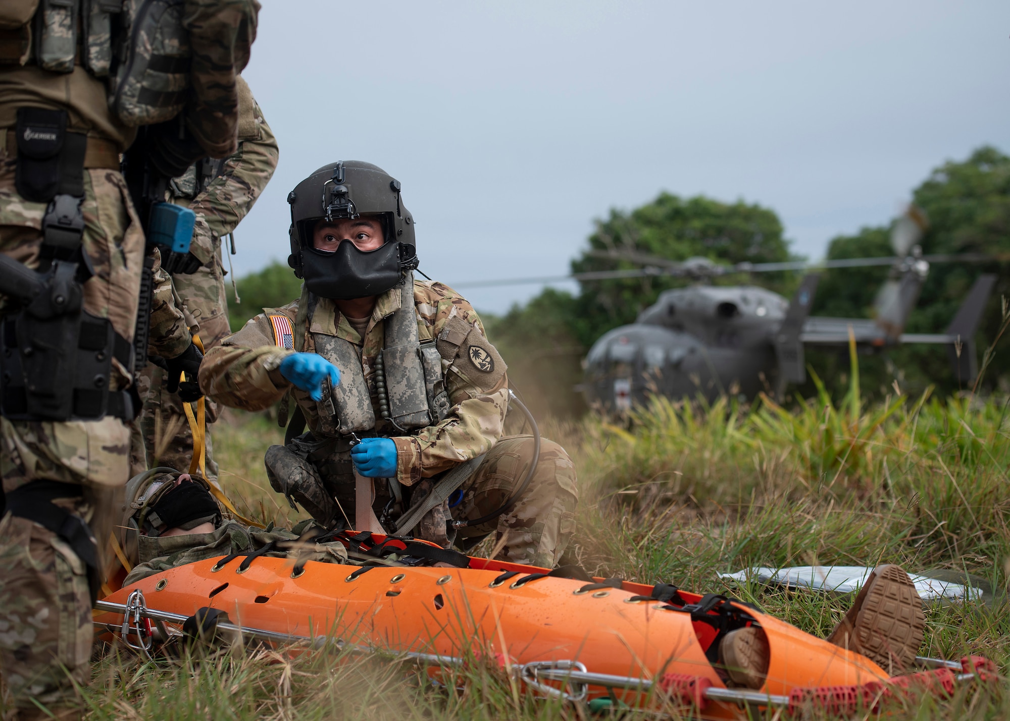 Sgt. Keoni Wong, Detatchment 2, Delta Company, 1st-224th Aviation (MEDEVAC), Guam National Guard, flight medic, provided emergency airlift support for Exercise Dragon Shield at Northwest Field, Guam, January 13, 2021.