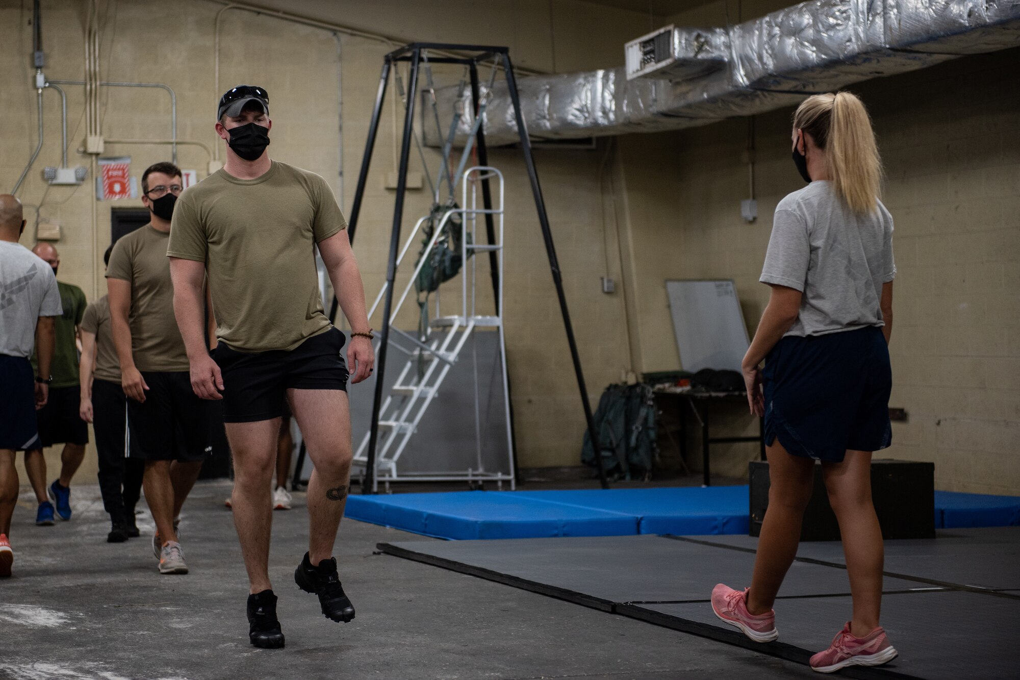 Defenders with the 36th Security Forces Squadron perform mobility-focused strength training as part of the Air Force Defender Performance Optimization training guide, Feb. 23, 2021 at Andersen Air Force Base, Guam.