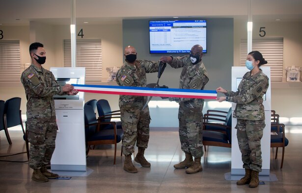 Brig. Gen. Shan Bagby, Brooke Army Medical Center commanding general, and Col. Stacey Causey, BAMC pharmacy chief, cut a ribbon during a Facebook Live ceremony, signifying the grand opening of the Fort Sam Houston Community Pharmacy at Joint Base San Antonio-Fort Sam Houston March 3.