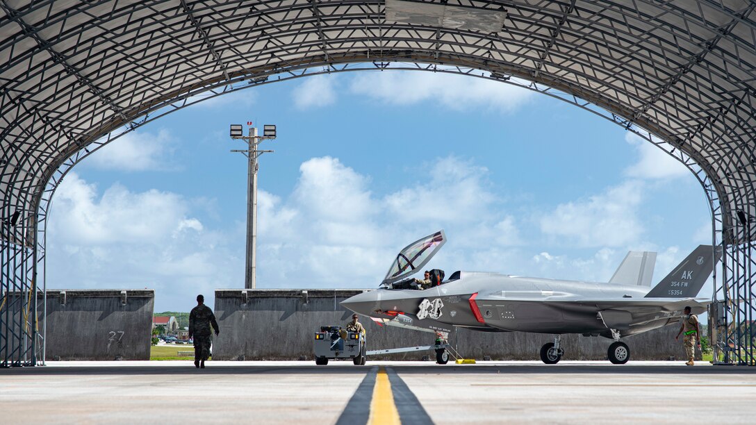 U.S. Air Force Staff Sgt. Roger Remoket tows an F-35 Lightning II at Andersen Air Force Base, Guam, Feb. 23, 2021.