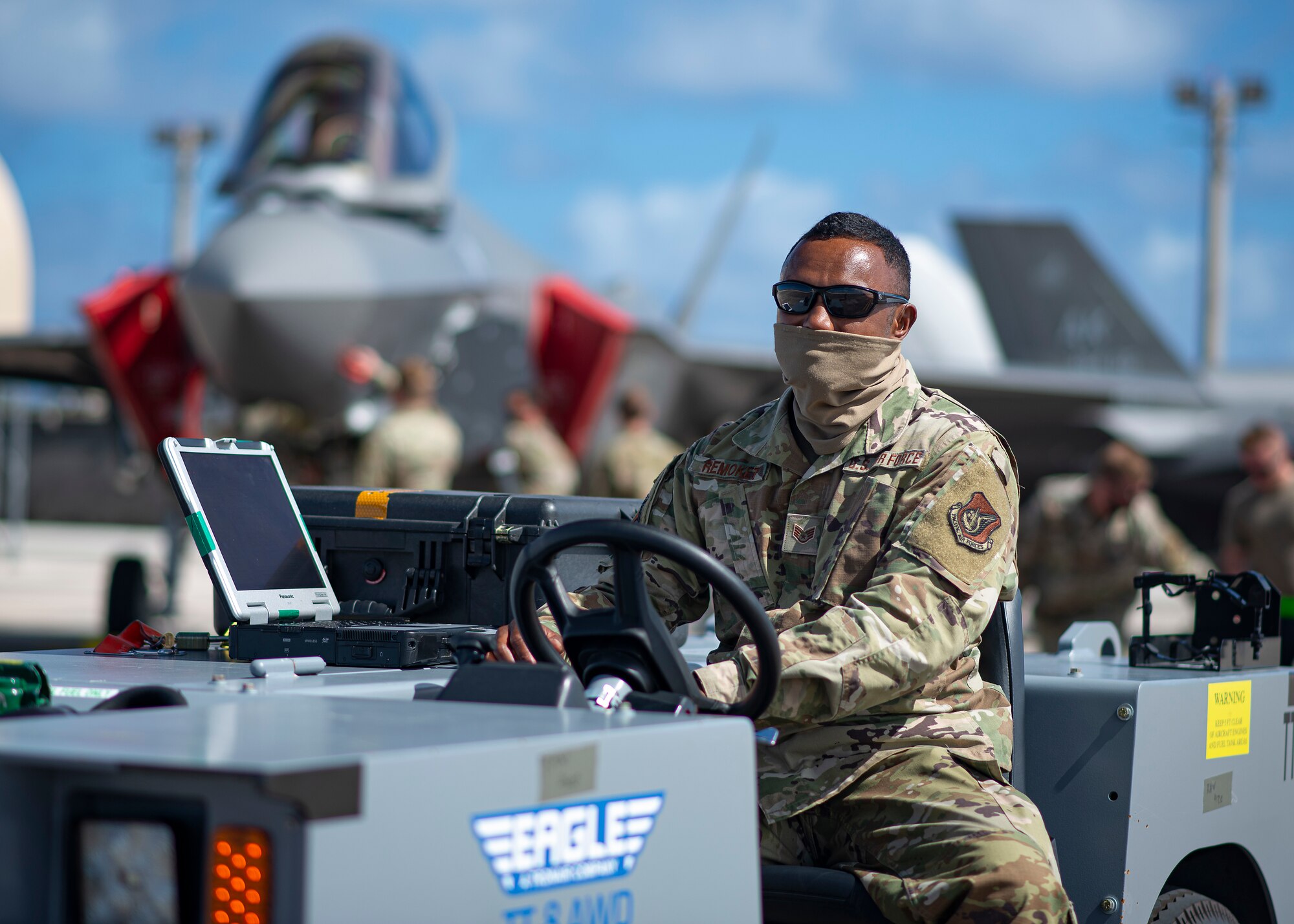U.S. Air Force Staff Sgt. Roger Remoket tows an F-35 Lightning II at Andersen Air Force Base, Guam, Feb. 23, 2021.