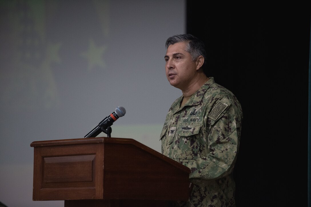 210304-N-KZ419-1085 NAVAL SUPPORT ACTIVITY BAHRAIN (March 4, 2021) - Capt. Oscar Rojas, incoming commanding officer of Commander, Task Force (CTF) 52, delivers remarks during a change of command ceremony onboard Naval Support Activity Bahrain, March 4. CTF 52 strengthens national and coalition mine countermeasures capabilities and capacity in order to promote a secure maritime environment in the U.S. Central Command area of responsibility. (U.S. Navy photo by Mass Communication Specialist 3rd Class Dawson Roth)