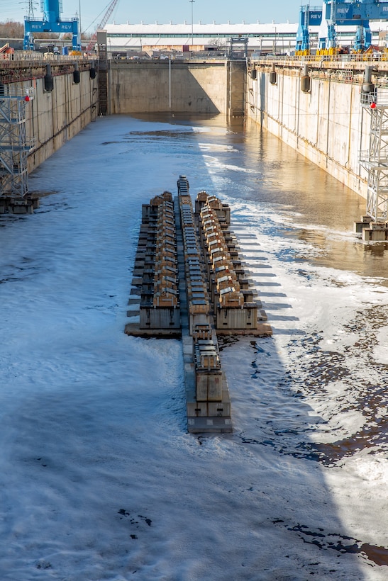 Dry Dock 8 is being flooded for the arrival of a U.S. Navy vessel.