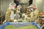 Michigan National Guard Soldiers with Michigan’s Task Force Spartan work with Gleaners of Warren, Michigan, Community Food Bank, Nov. 24, 2020. Army and Air National Guard members filled and labeled dry and frozen green bean bags and cold and dry food boxes, reaching a goal of 90,000 lbs. during the Thanksgiving holiday week.