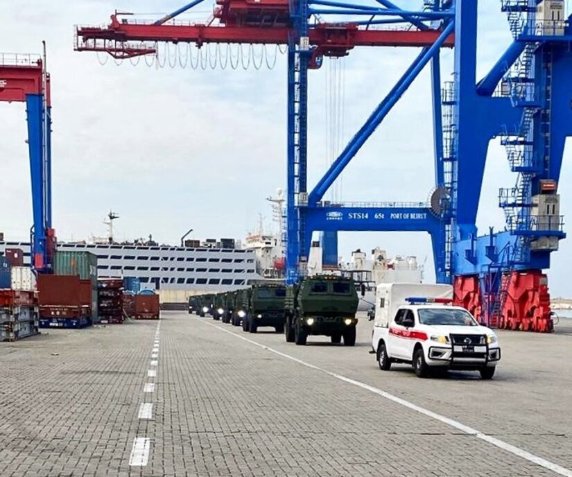 FMTV trucks roll down the pier at the port of Beirut, Lebanon, after the Army Security Assistance Enterprise overcame pandemic restrictions, quality control and logistical challenges, to deliver ahead of schedule, 31 FMTV trucks to Lebanese Armed Forces.