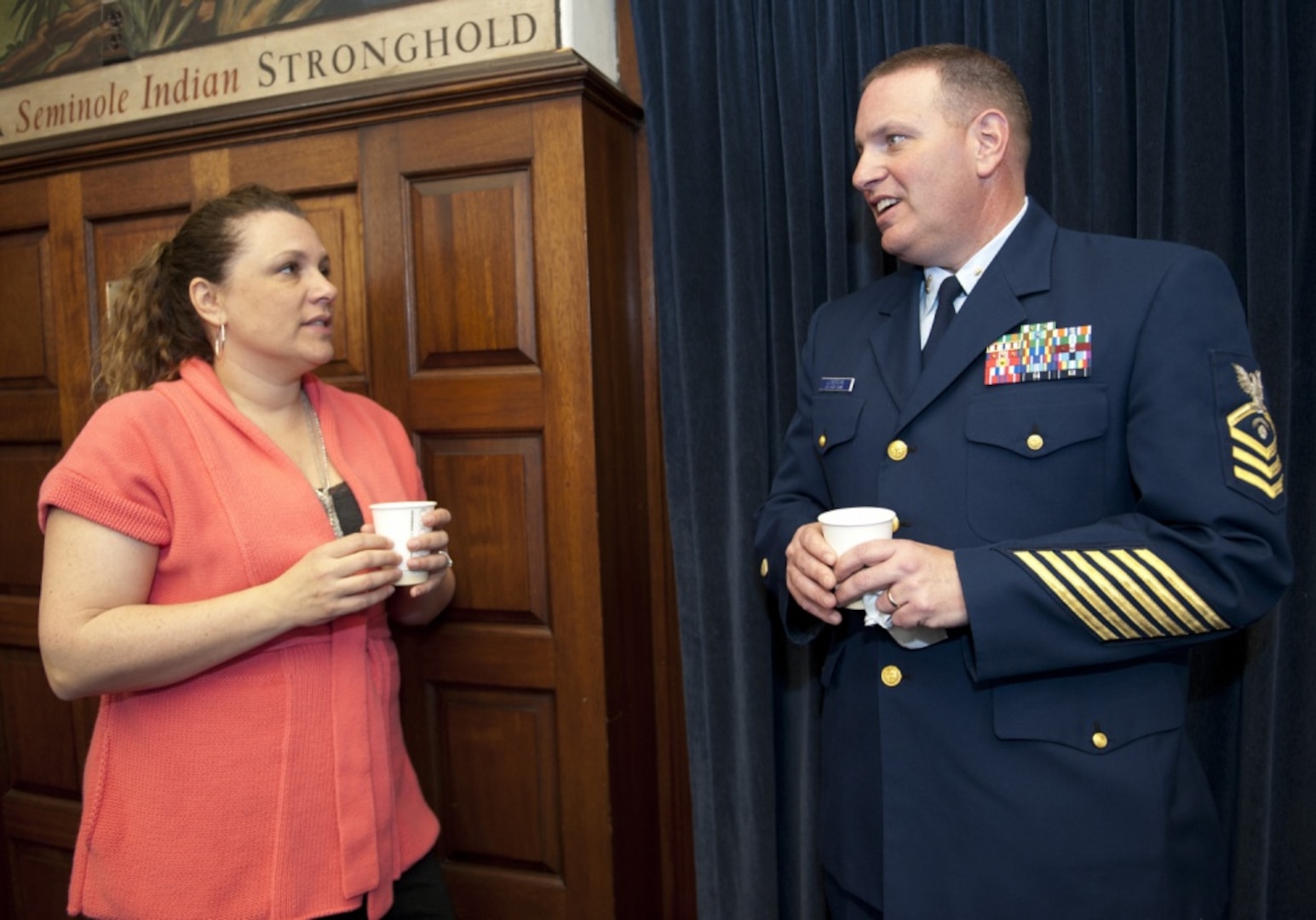 U.S. Coast Guard Academy Sexual Assault Response Coordinator Shannon Norenburg speaks with Chief Petty Officer Todd Lonergan during a Sexual Assault Response and Prevention meeting April 3, 2013, at the U.S. Coast Guard Academy in New London, Conn. The chiefs came together to unite against sexual assault at the academy and had the opportunity to hear from the academy's sexual assault response coordinator and superintendent of the academy. (U.S. Coast Guard photograph by Petty Officer 3rd Class Diana Honings/RELEASED)