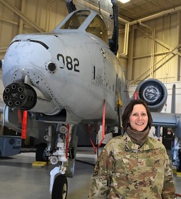 U.S. Air Force Master Sgt. Linda Musto, 175th Maintenance Squadron first sergeant, stands in front of an A-10C Thunderbolt II aircraft at Warfield Air National Guard Base at Martin State Airport, Baltimore, Md., March 2, 2021. Musto was an aircraft armament systems mechanic before her current role. (U.S. Air National Guard photo by Master Sgt. Christopher Schepers)