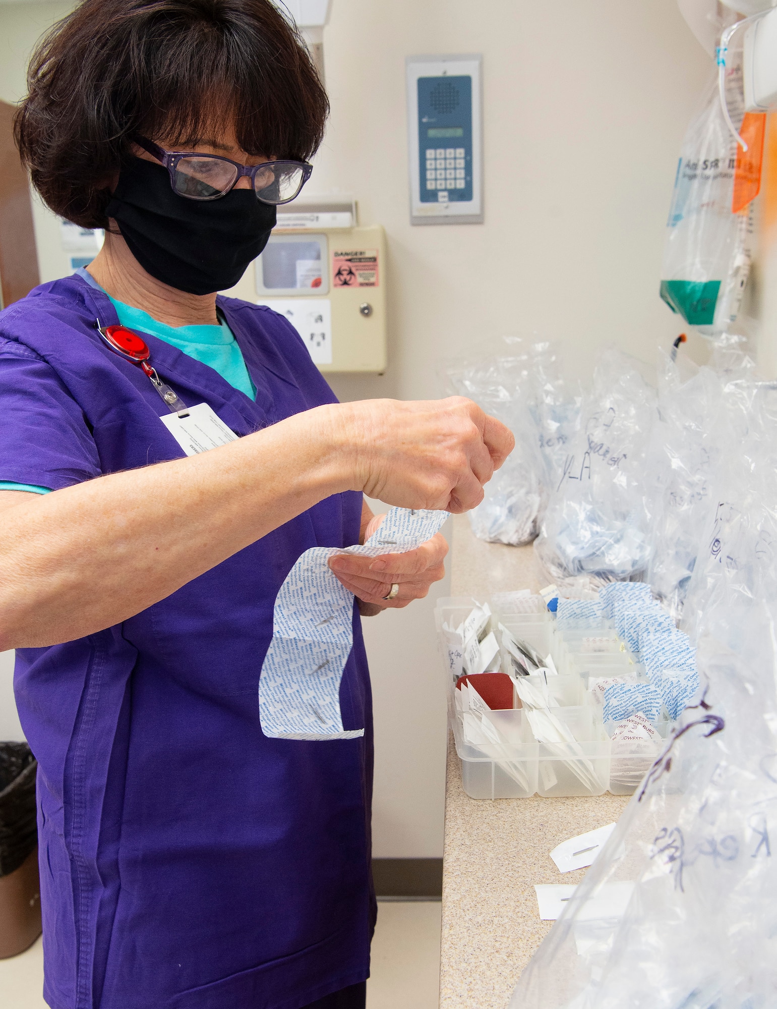 Kathy Calhoun, 88th Dental Squadron, sorts through dental burs Feb. 22, 2021, in the dental clinic at Wright-Patterson Air Force Base, Ohio. Calhoun came to work for the Wright-Patt clinic after 32 years in the private sector. (U.S. Air Force photo by R.J. Oriez)