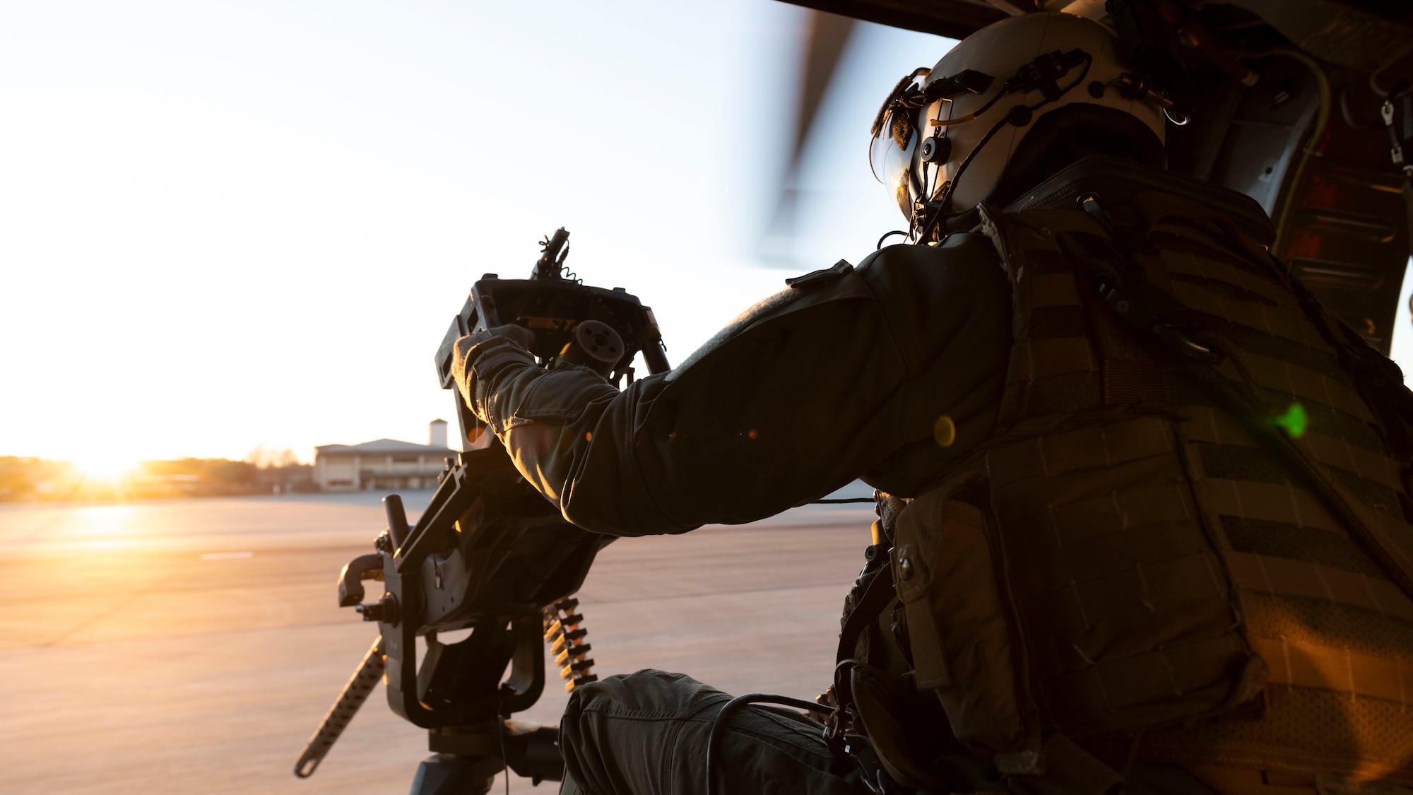 U.S. Navy Naval Aircrewman (Helicopter) 3rd Class Hayden Sosh, assigned to Helicopter Sea Combat Squadron Nine, mans the M3 .50-caliber machine gun on a MH-60 Seahawk Helicopter during Emerald Warrior 21.1, at Hurlburt Field, Florida, Feb. 19, 2021. Emerald Warrior is the largest joint special operations exercise involving U.S. Special Operations Command forces training to respond to various threats across the spectrum of conflict. Special Operations Forces work as part of a larger operational and strategic framework to integrate with partner nations and as force multipliers to conventional operations. (U.S. Air Force photo by Senior Airman Edward Coddington)