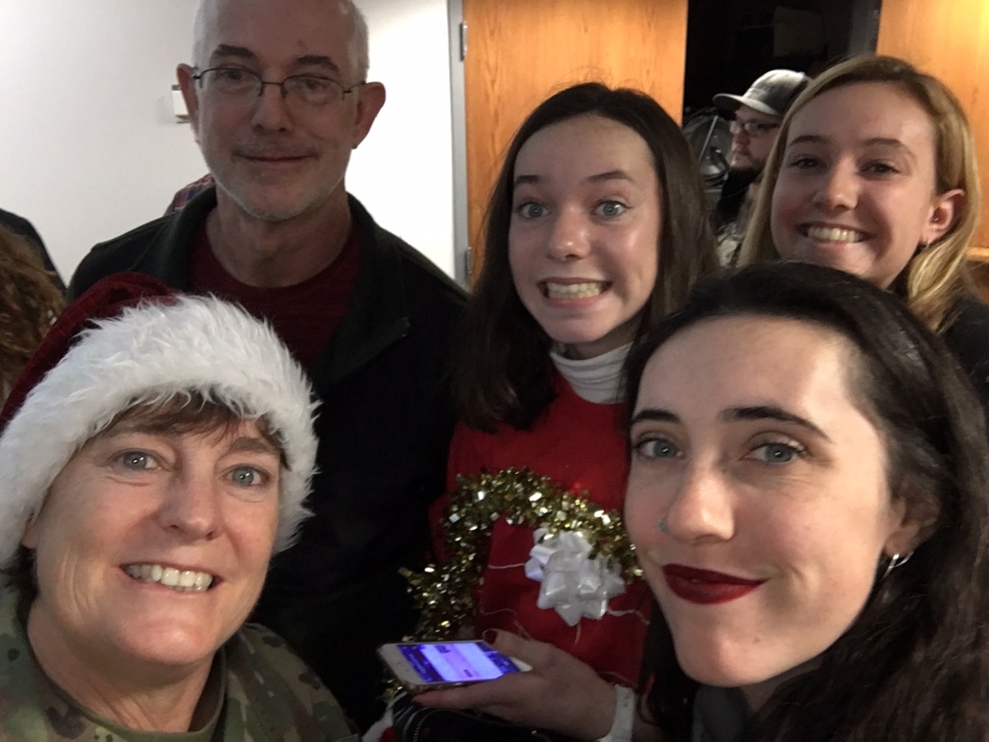 Brig. Gen. Michelle Rose (left) poses with her family during the 2019 holiday season.