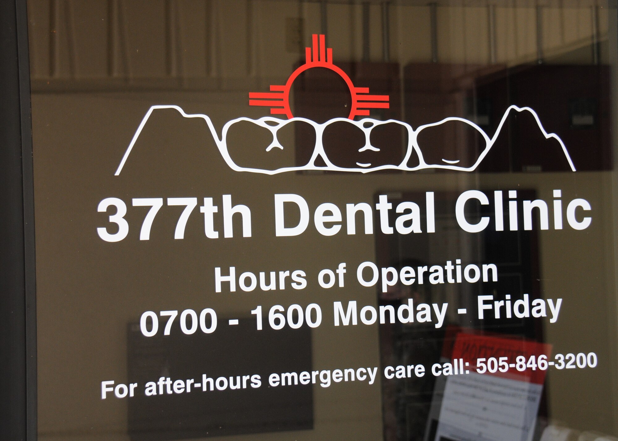 "Molar Mountain" graphic on Dental Clinic door.