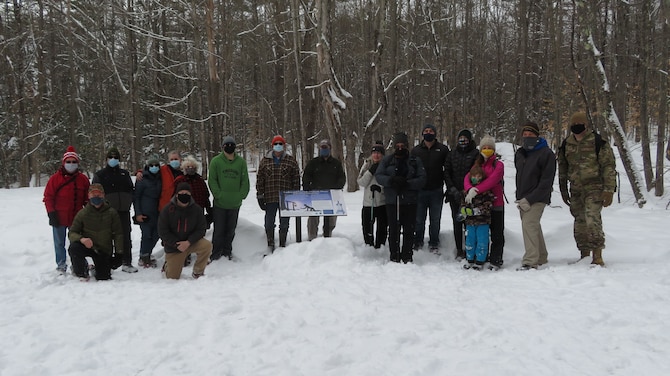 NEW BOSTON AIR FORCE STATION, N.H. – Members of New Boston Air Force Station and the local community pose for a photo during their hike to  the Melendy Farmsted r, Feb. 20, 2021.  During the event, hikers learned about the history of abolitionists Luther and Lucinda Melendy owners of the Melendy Farmstead and one of the last stops on the Underground Railroad.(Courtesy photo)