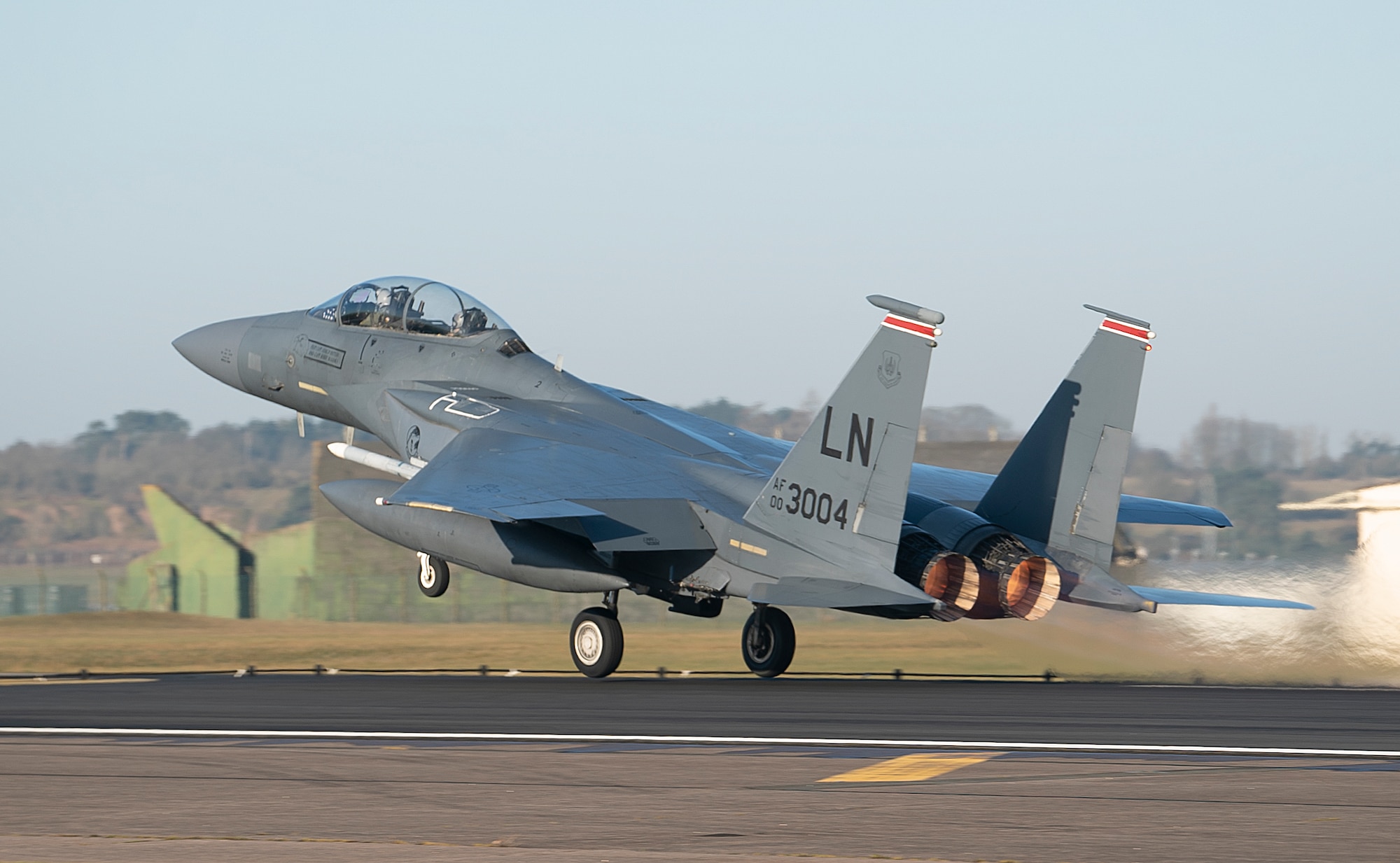 An F-15E Strike Eagle assigned to the 494th Fighter Squadron takes off for an orientation flight at Royal Air Force Lakenheath, England, Feb. 26, 2021. Prior to an orientation flight, candidates must pass a flight physical, be fitted for gear with Aircrew Flight Equipment and attend numerous briefings including egress and harness training. (U.S. Air Force photo by Airman 1st Class Jessi Monte)