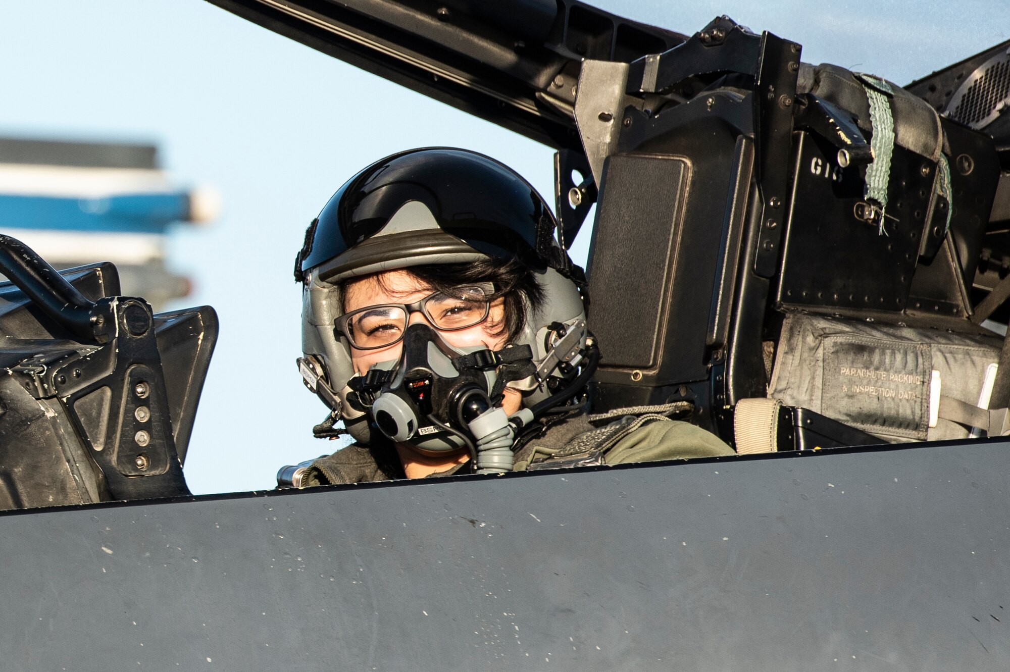 U.S. Air Force Airman 1st Class Nancy Montalvo, 48th Operations Support Squadron aircrew flight equipment journeyman, sits in the backseat of an F-15E Strike Eagle prior to an orientation flight at Royal Air Force Lakenheath, England, Feb. 26, 2021. Prior to an orientation flight, candidates must pass a flight physical, be fitted for gear with Aircrew Flight Equipment and attend numerous briefings including egress and harness training. (U.S. Air Force photo by Airman Jacob Wood)