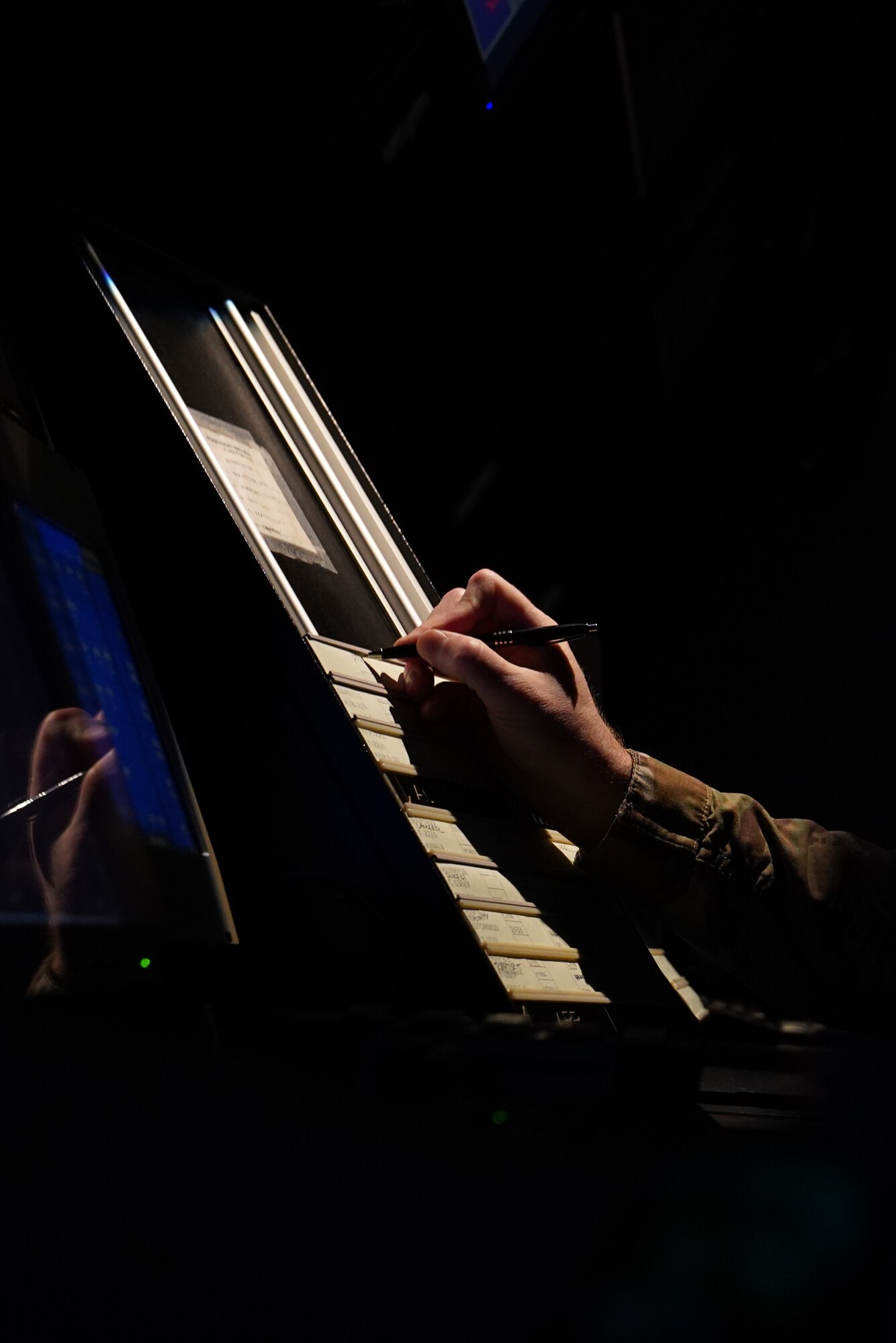 U.S. Air Force Tech. Sgt. Dustin Brannan, 334th Training Squadron air traffic control instructor, practices air traffic simulations inside Cody Hall at Keesler Air Force, Mississippi, March 4, 2020. Brannan was selected to be a part of the Air Education and Training Command Air Traffic Control Rapid Response Team, initiated to combat the potential loss of manning due to COVID-19. (U.S. Air Force photo by Senior Airman Seth Haddix)