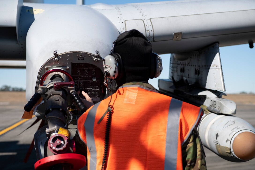 A photo of an airman fueling an A-10C Thunderbolt II.