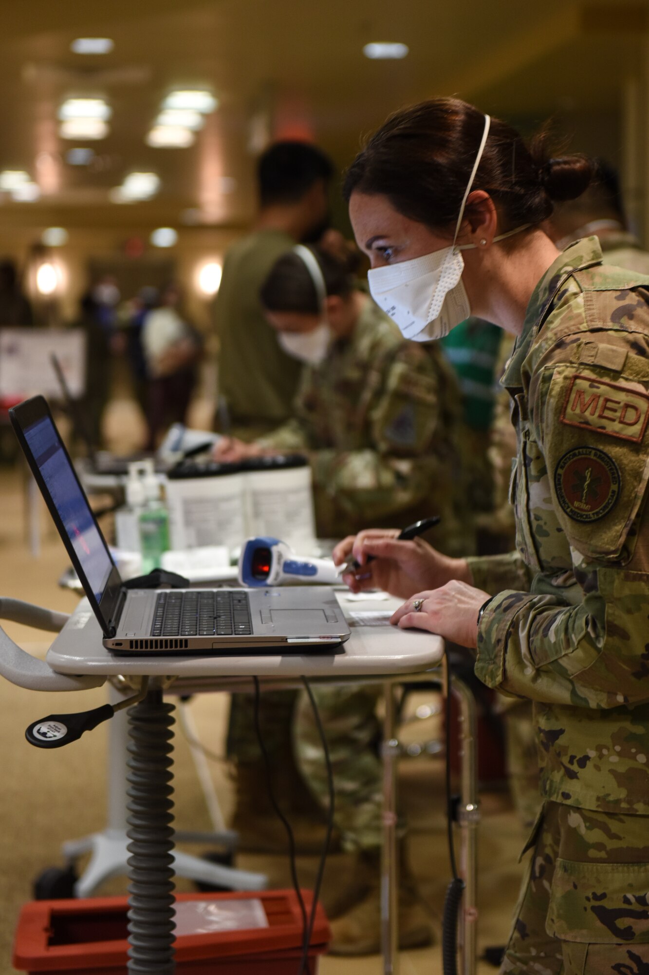 Photo of medical workers at POD stations