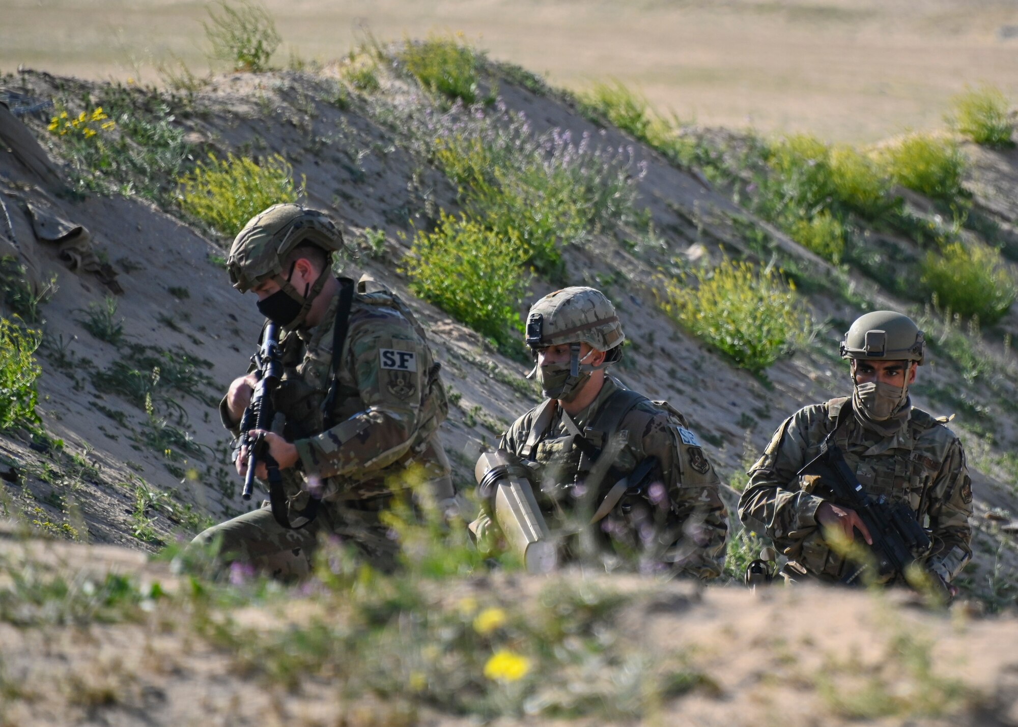 A photo of Airmen securing a scene