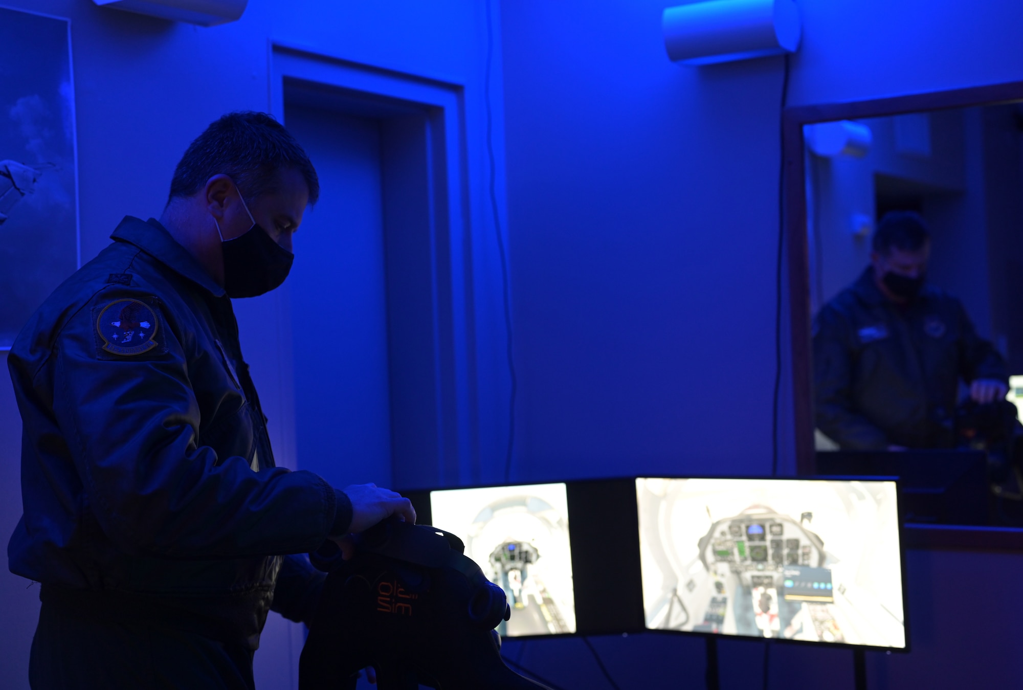 U.S. Air Force L.t Col. Joseph McCane, 14th Student Squadron commander, explores a virtual reality headset during the grand opening of a training room provide for student pilots in the unaccompanied officer dorms, Feb. 12, 2021, on Columbus Air Force Base, Miss. Access to virtual reality training will help student pilots awaiting training to better prepare for Specialized Undergraduate Pilot Training. (U.S. Air Force photo by Airman 1st Class Jessica Haynie)