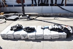 Bales of cocaine sit on the deck of Coast Guard Cutter Heriberto Hernandez.
