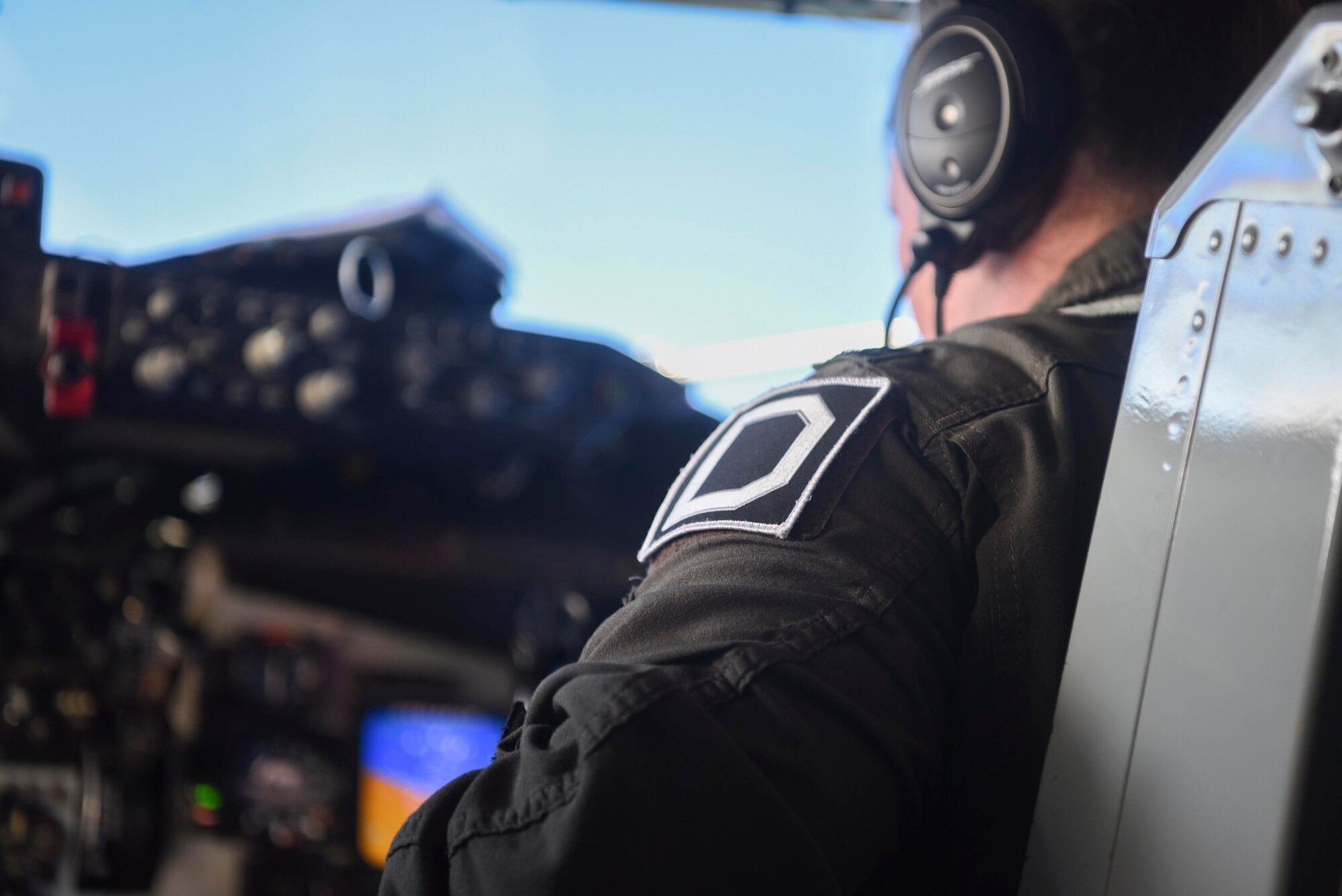 U.S. Air Force Capt. Julianne Germain, 351st Air Refueling Squadron pilot, flies a KC-135 Stratotanker aircraft assigned to the 100th Air Refueling Wing, Royal Air Force Mildenhall, England, during a Bomber Task Force mission over the North Sea March 3, 2021. The wing, which is the only permanent aerial refueling unit in U.S. Air Forces in Europe and Air Forces Africa, is represented by the “Square D” badge of its World War II predecessor unit. (U.S. Air Force photo by Senior Airman Joseph Barron)