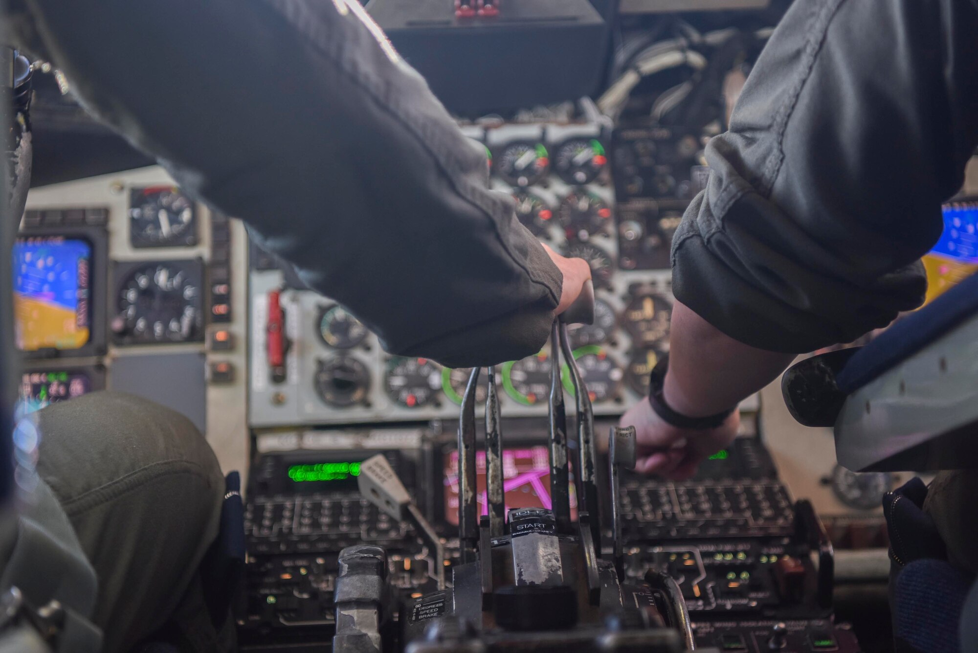 U.S. Air Force 1st Lt. Michael Nall, 351st Air Refueling Squadron pilot, left, and Capt. Julianne Germain, 351st Air Refueling Squadron pilot, fly a KC-135 Stratotanker aircraft assigned to the 100th Air Refueling Wing, Royal Air Force Mildenhall, England, during a Bomber Task Force mission over the North Sea March 3, 2021. The 100th Air Refueling Wing conducts air refueling and combat support operations throughout the European and African area of responsibility. (U.S. Air Force photo by Senior Airman Joseph Barron)