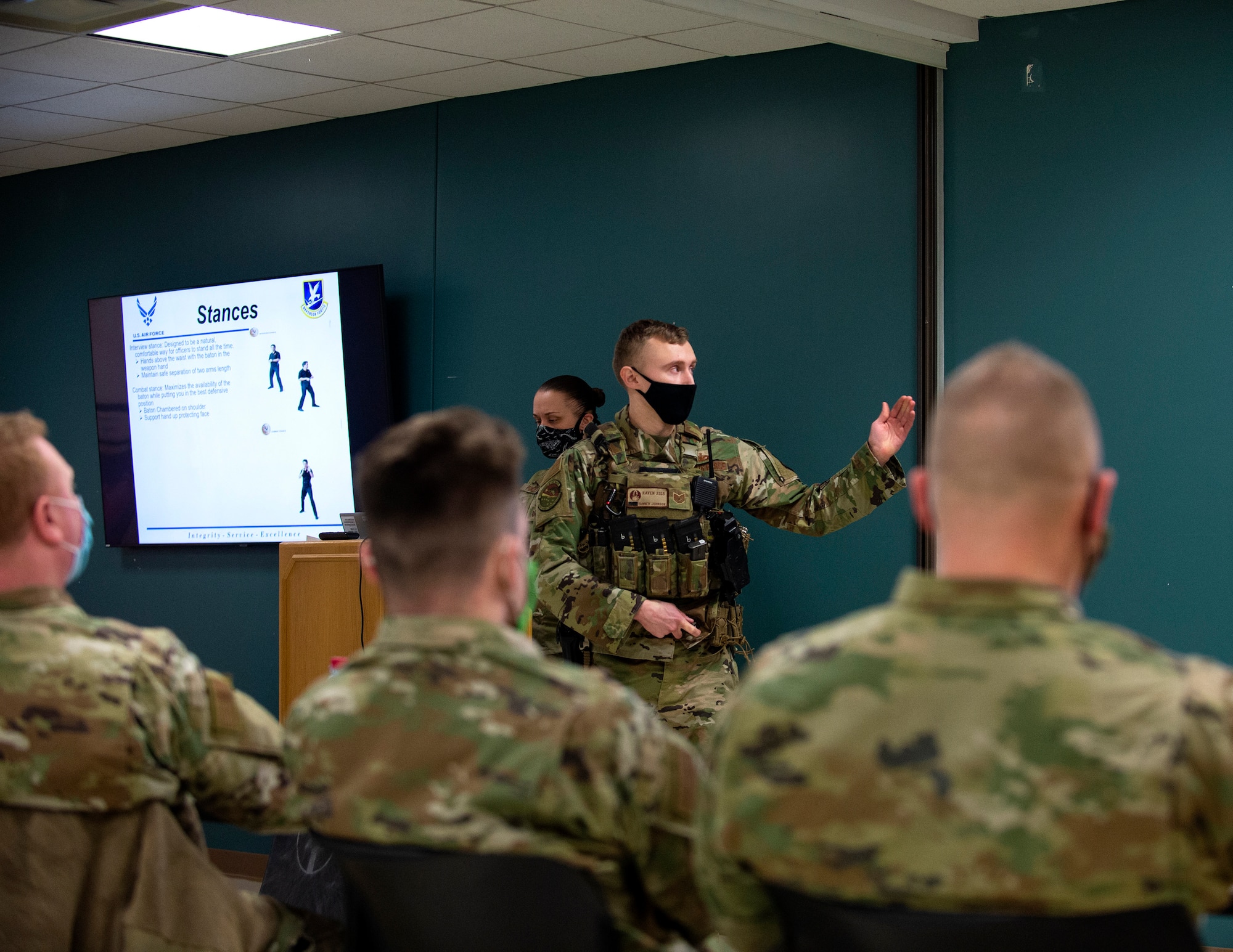 U.S. Air Force Tech. Sgt. Tanner Johnson, 133rd Security Forces Squadron, teaches a class on how to use a collapsible baton in St. Paul, Minn., Feb. 24, 2021. Members from the 133rd Airlift Wing are taking part in the annual security augmentee training program, which equips base personnel with the fundamentals skills required to assist Security Forces if called upon.