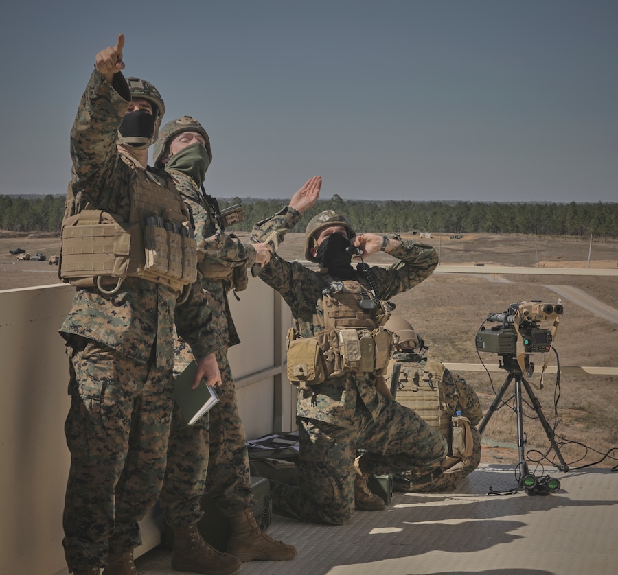 Marines with Marine Forces Reserve await aircraft during Tactical Air Control Party (TACP) training as a part of a Close Air Support Exercise (CASEX) at Camp Shelby, Mississippi, Feb. 26, 2021. TACP members are responsible for accurately locating targets for fire missions, providing battle damage assessment, and aid in neutralizing enemies to meet the ground force commander's intent. (U.S. Marine Corps Photo by Lance Cpl. Ashley Corbo)