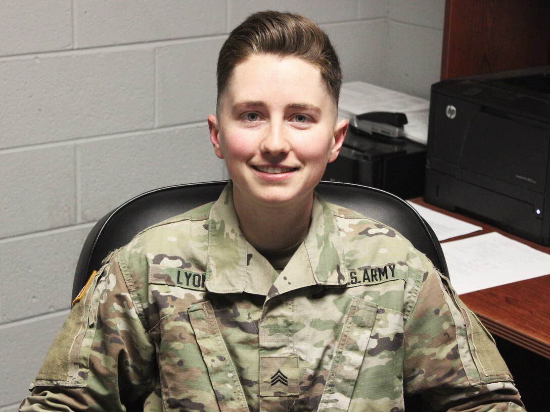 , Sgt. Cassandra Lyons, the supply sergeant for Alpha Company, 229th Brigade Engineer Battalion, 116th Infantry Brigade Combat Team, poses in her office March 2, 2021, in Fredericksburg, Virginia. (U.S. Army National Guard photo by Spc. Holden Russell)