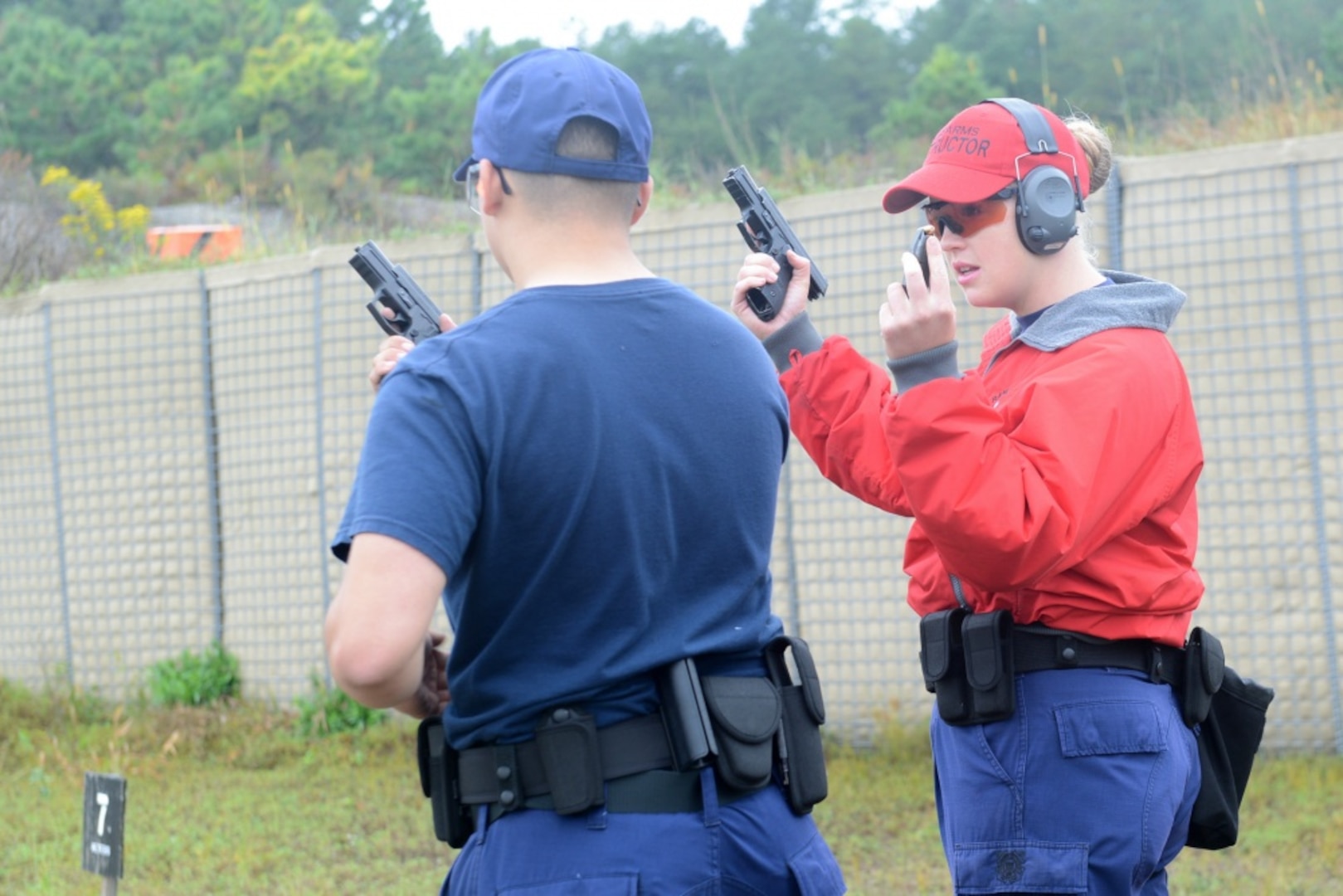 Coast Guard Petty Officer 2nd Class Cassandra Kintzley, a gunner’s mate at Coast Guard Sector Boston, works at the Fort Devens firing range, in Massachusetts, Wednesday, September, 20, 2017, to qualify Coast Guard members in weapons handling. Kintzley, a highly skilled shooter, trains Coast Guard men and women who enforce maritime laws, and protect Northeast ports and waterways. U.S. Coast Guard photo by Petty Officer 2nd Class Cynthia Oldham.