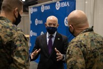 U.S. Secretary of Homeland Security Alejandro N. Mayorkas meets with U.S. Marines assigned to Combat Logistics Battalion 22 (CLB-22) to discuss vaccination operations during the soft launch of the state-run, federally-supported Center City Community Vaccination Center at the Pennsylvania Convention Center in Philadelphia, March 2, 2021.
