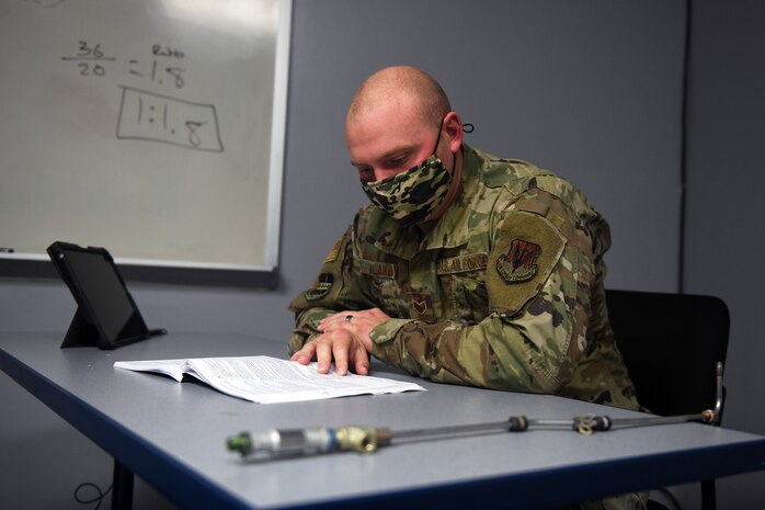 Staff Sgt. Jonathan Blaker, 9th Maintenance Squadron repair and reclamation craftsman, studies for the Airframe and Powerplant (A&P) exams, Feb. 10, 2021, at Beale Air Force Base, California. An A&P certification shows that the Airmen has the skill and knowledge to inspect, maintain and repair aircraft, which is administered by the Federal Aviation Administration. Airmen working to obtain an A&P certification must pass four separate exams: airframe, general, powerplant, and an oral and practical test. (U.S. Air Force photo by Airman 1st Class Luis A. Ruiz-Vazquez)