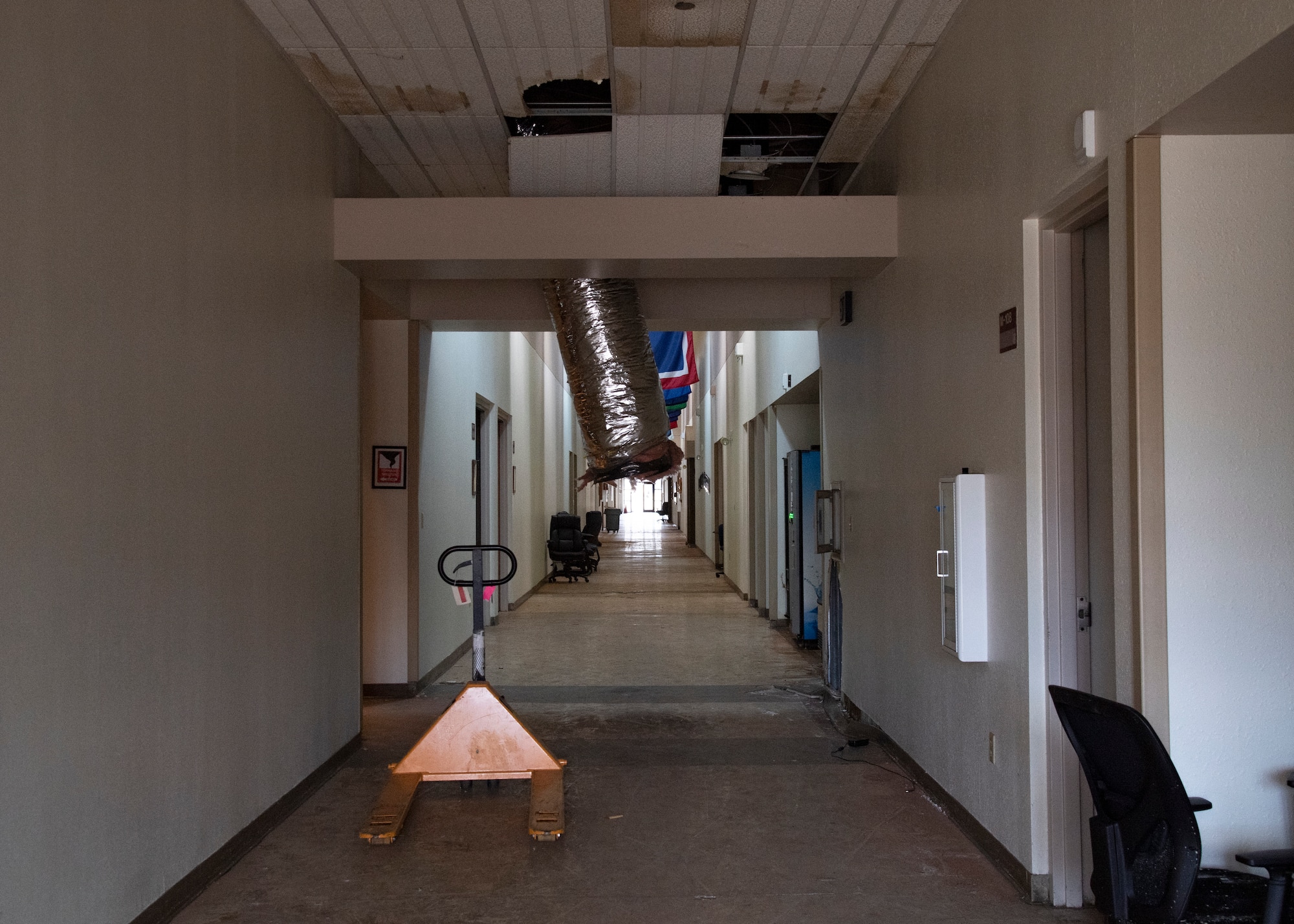 The damaged main corridor of the 361st Training Squadron's Aerospace Ground Equipment schoolhouse at Sheppard Air Force Base, Texas, March 4, 2021. The Feb. 14, 2021, snowstorm damaged the AGE schoolhouse leaving it defunct. This whole corridor was flooded and was the most damaged part of the schoolhouse. (U.S. Air Force photo by Senior Airman Pedro Tenorio)
