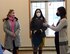 Cindy Wilsbach (left), spouse of Pacific Air Forces commander Gen. Ken Wilsbach, and Dr. Doniel Wolfe, spouse of PACAF Command Chief Master Sgt. David Wolfe, meet with Paige Ellsworth, a Corvias Leasing and Resident Center leasing resident associate, during a visit to Eielson Air Force Base, Alaska, Feb. 19, 2021