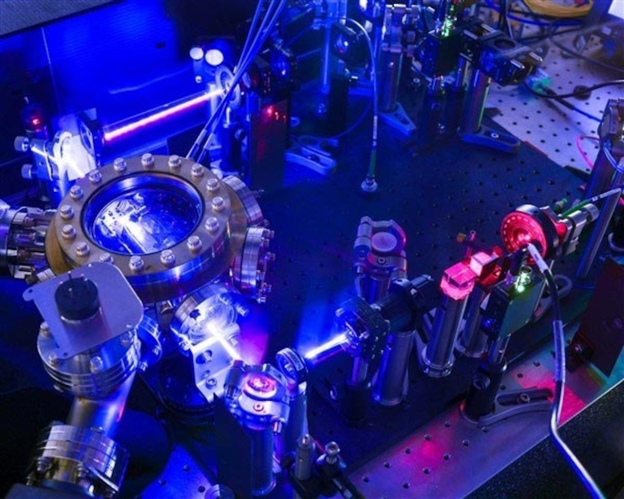 An apparatus lights up under a blue glow.