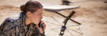 U.S. Marine Corps Lance Cpl. Marilyn Hanley, a field radio operator with Marine Medium Tiltrotor Squadron (VMM) 165 (Reinforced), 11th Marine Expeditionary Unit (MEU), conducts radio checks with various aircraft during Realistic Urban Training (RUT) at Marine Corps Air Station Yuma, Arizona, Feb. 17, 2021. RUT is the final shore-based predeployment exercise for the 11th MEU and provides an opportunity to train and execute operations in an urban environment. (U.S. Marine Corps photo by Cpl. Seth Rosenberg)