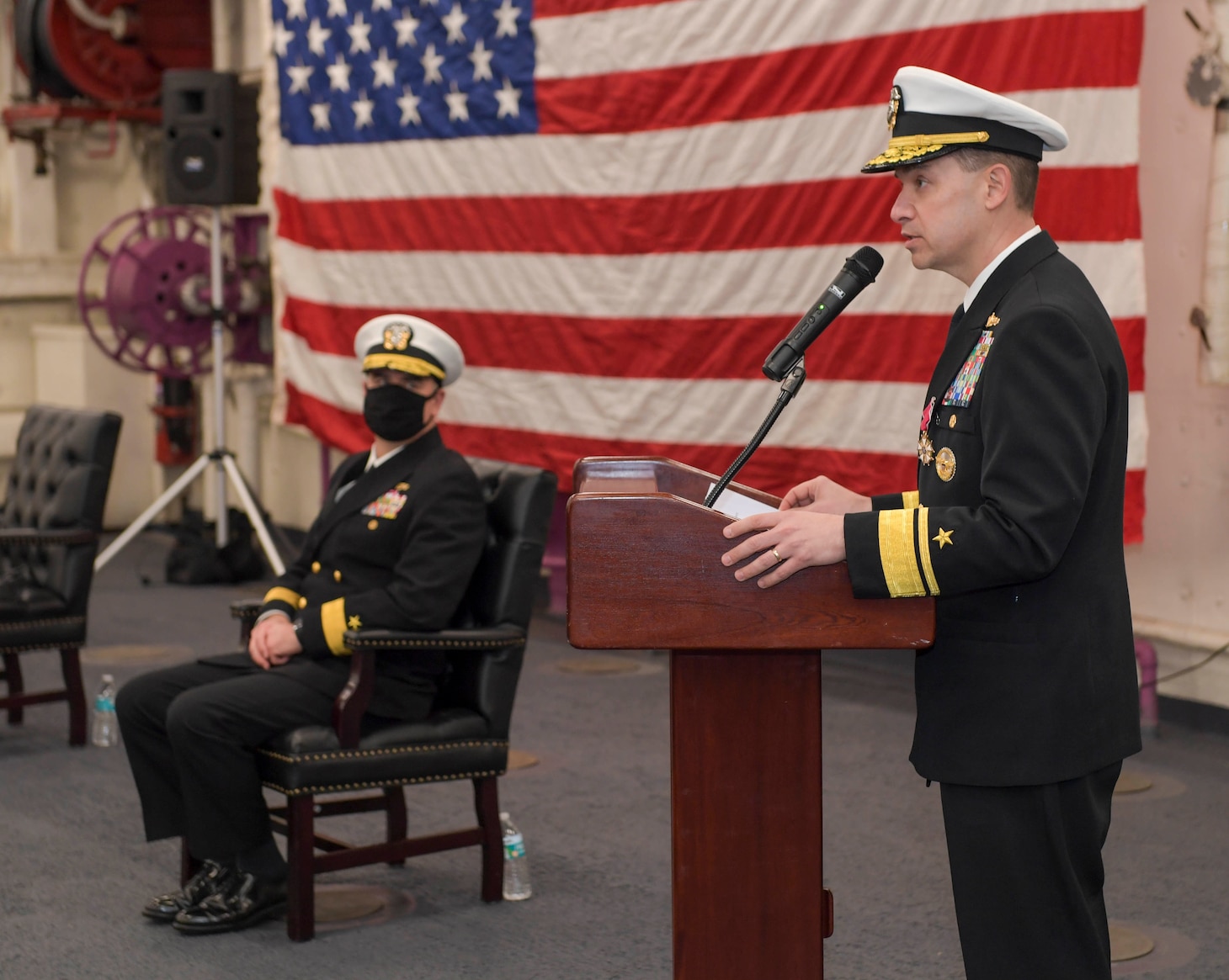 Rear Adm. Brad Cooper speaks during the Naval Surface Force Atlantic (SURFLANT) change of command ceremony aboard the San Antonio-class amphibious transport dock ship USS Mesa Verde (LPD 19).