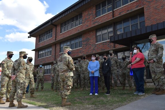 U.S. Air Force Col. Andres Nazario, 17th Training Wing commander, speaks with the 344th Military Intelligence Battalion about resiliency and thriving after announcing the 17th TRW 2020 Annual Award winners outside the Vance-Nolan building on Goodfellow Air Force Base, Texas, March 5, 2021. Joint service members were able to participate in multiple categories of awards for the year. (U.S. Air Force photo by Staff Sgt. Seraiah Wolf)