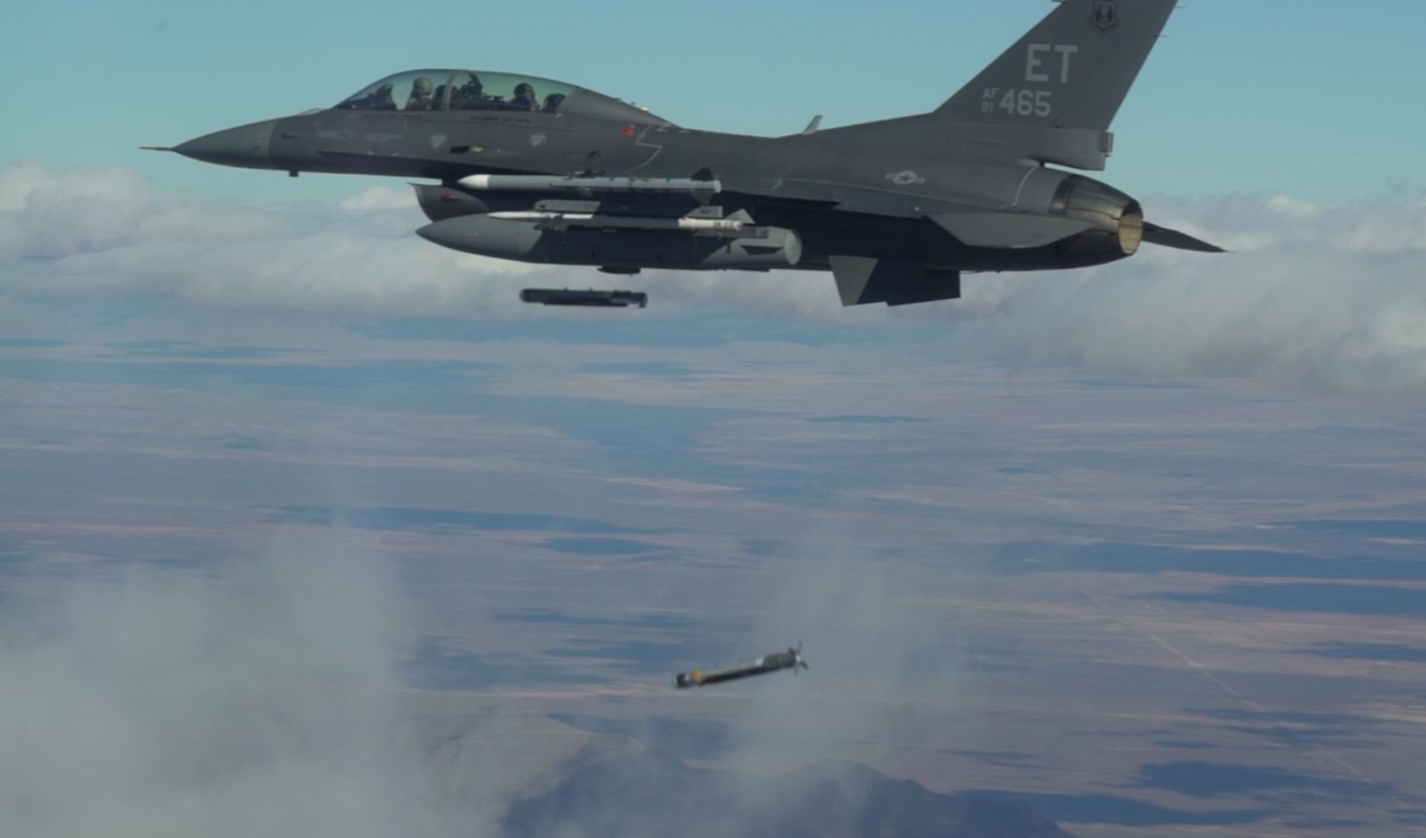 Collaborative Small Diameter Bombs (CSDBs) are launched from the wing of an F-16 fighter from the Air Force Test Center’s 96th Test Wing at Eglin AFB. Four of the bombs were dropped during the second flight demonstration of the Air Force Golden Horde Vanguard on February 19th. (Courtesy photo)