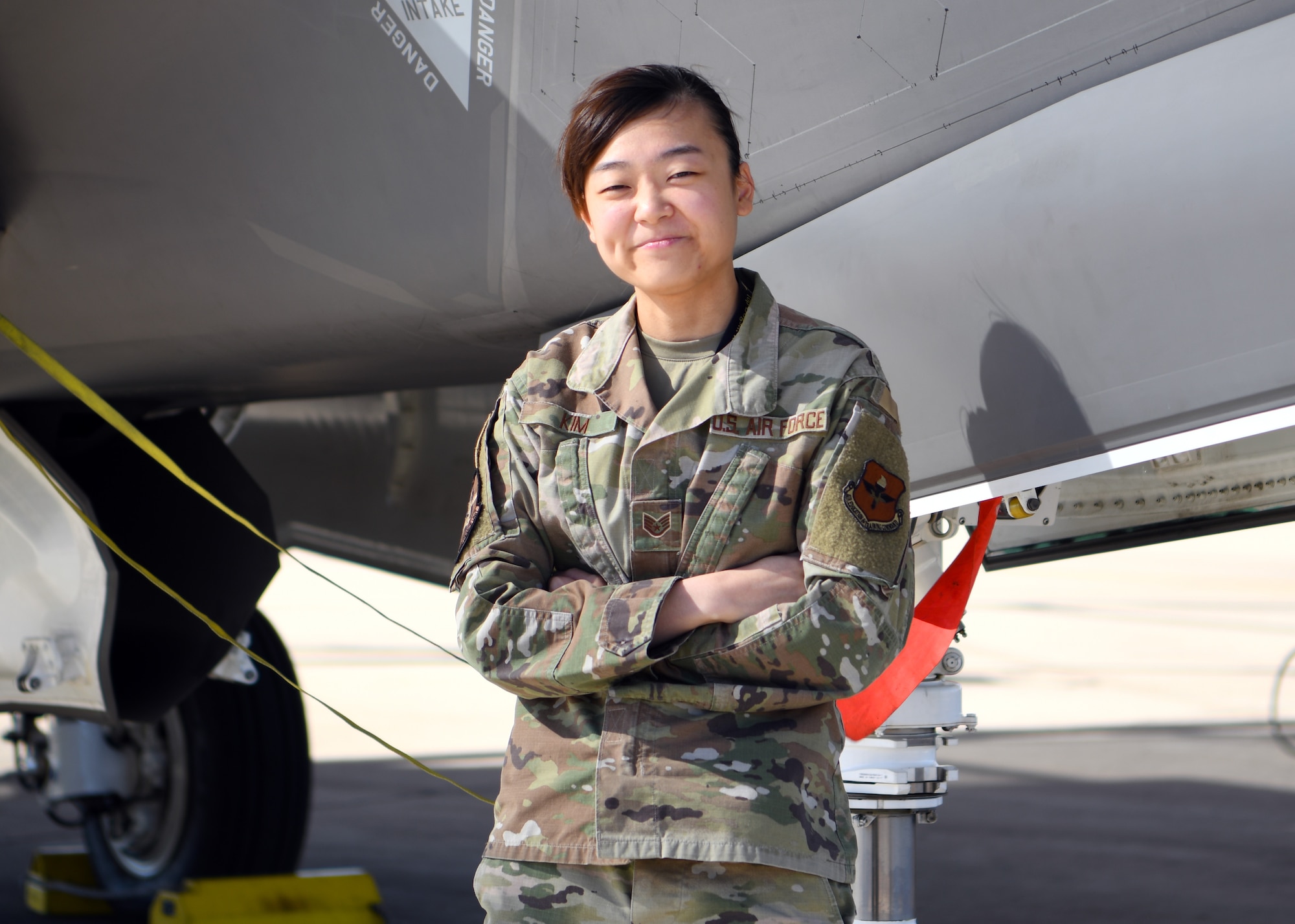 Staff Sgt. Janet Kim, 61st Aircraft Maintenance Unit F-35 avionics craftsman, poses for a photo, Feb. 25, 2021, at Luke Air Force Base, Arizona.