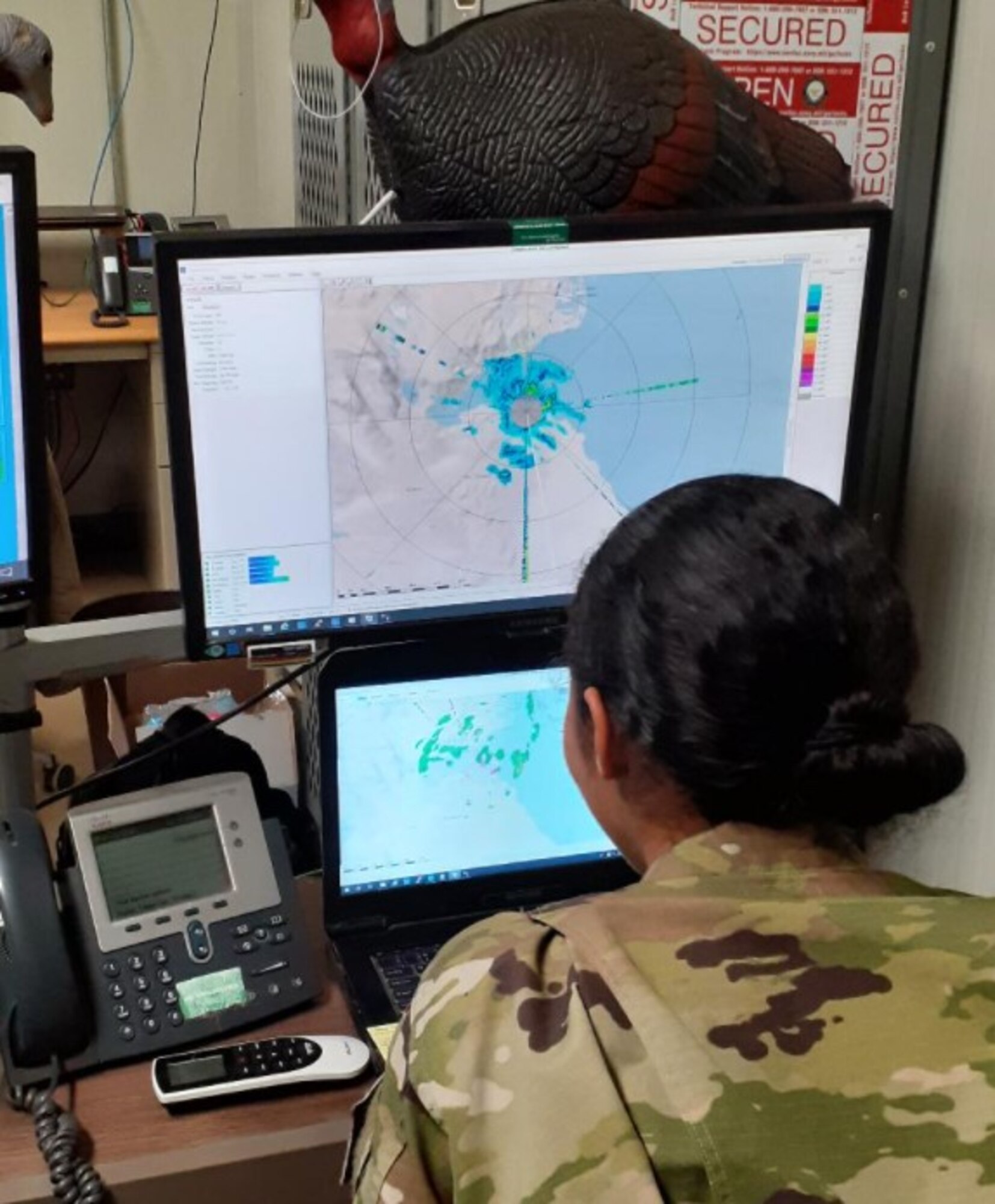 U.S. Air Force Airman 1st Class Marisa Paʻaʻāina, 776th Expeditionary Air Base Squadron weather forecaster, interrogates and tracks storms on the Portable Doppler Radar at Camp Lemonnier, Djibouti, Feb. 24, 2021.