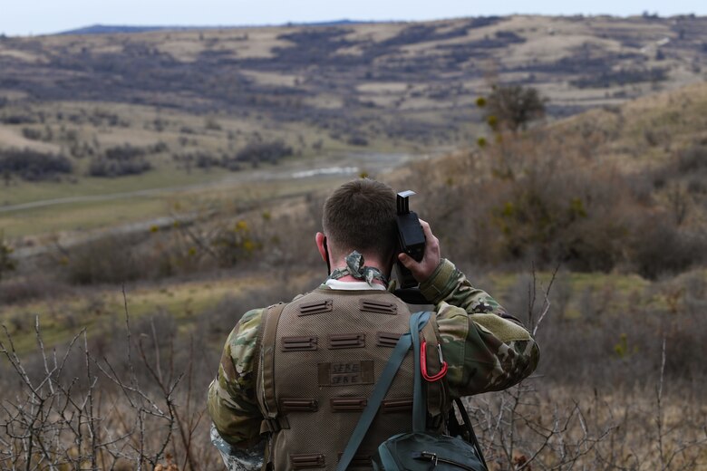 U.S. Air Force Capt. Austin Huff, 510th Fighter Squadron F-16 Fighting Falcon pilot, listens to his radio during Operation Porcupine in Romania, March 4, 2021.