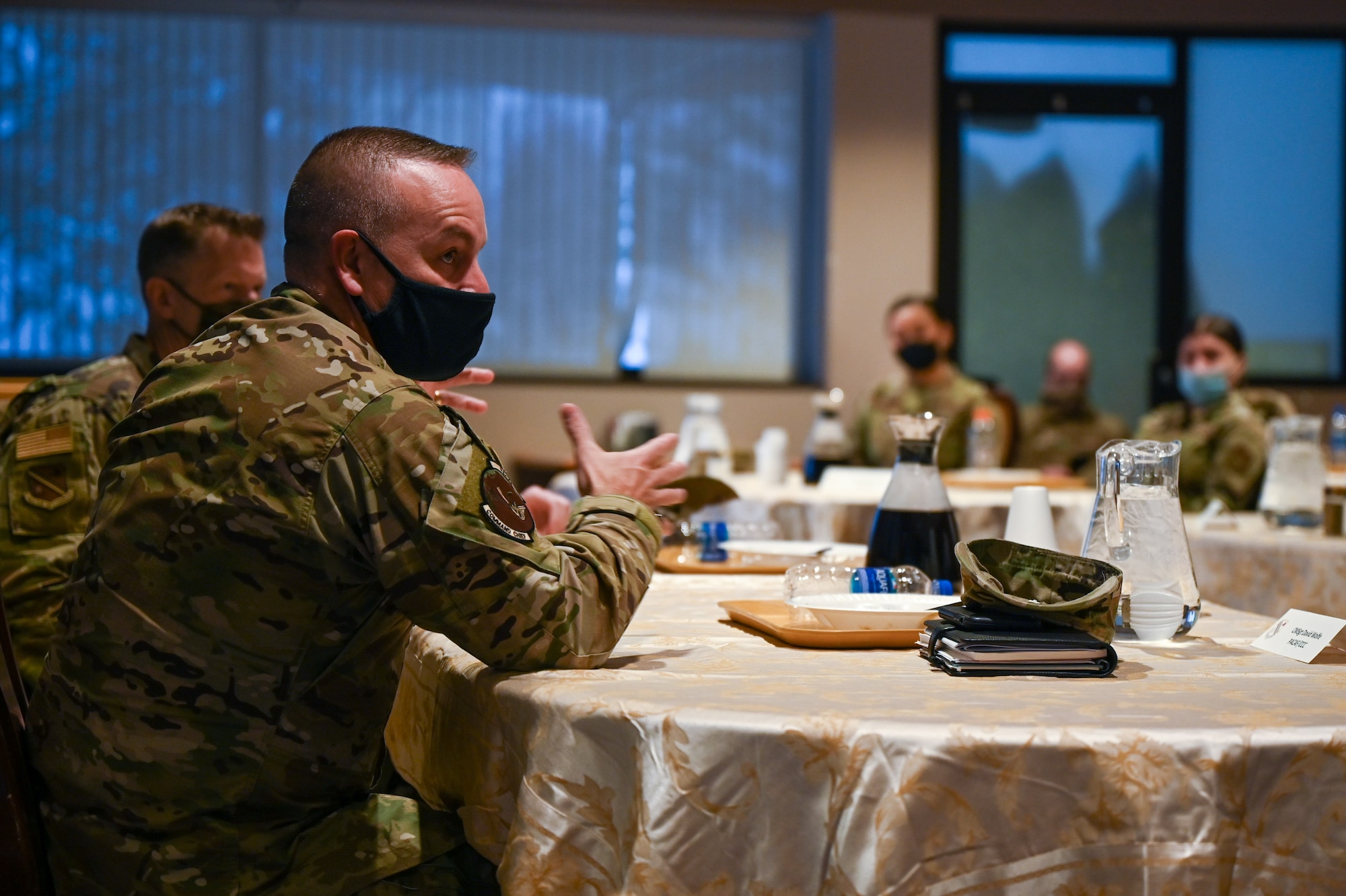 U.S. Air Force Chief Master Sgt. Dave R. Wolfe, Pacific Air Forces command chief, interacts with Airmen assigned to the 354th Fighter Wing, during a PACAF leadership visit to Eielson Air Force Base, Alaska, Feb. 19, 2021.