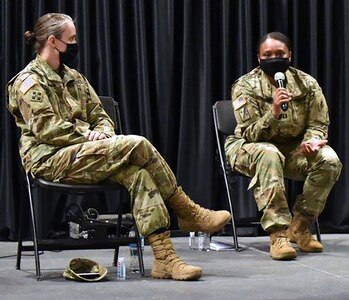 Capt. Cotrena Brown-Johnson (right) answers a question during the Women’s History Month panel discussion.